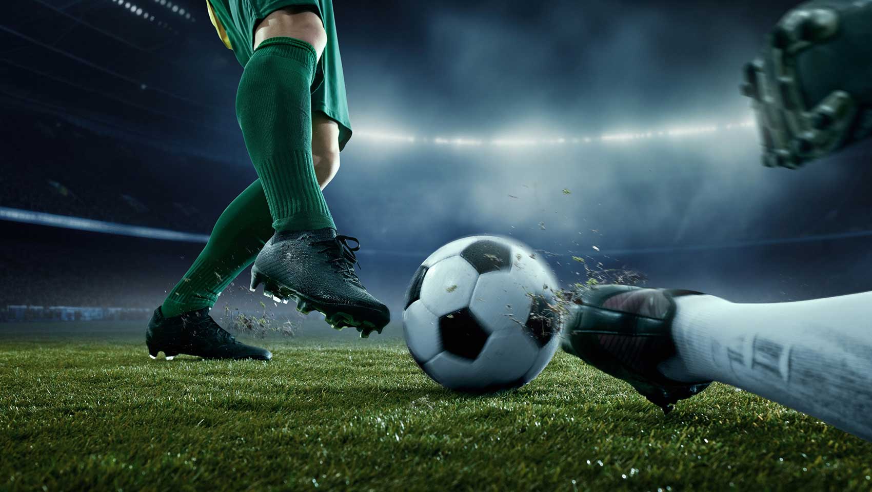 Two soccer players on field