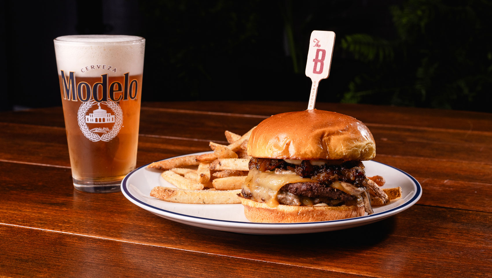 Burger, Fries and a beer at the Soccer watch party set-up at Willow Bar at The Betty