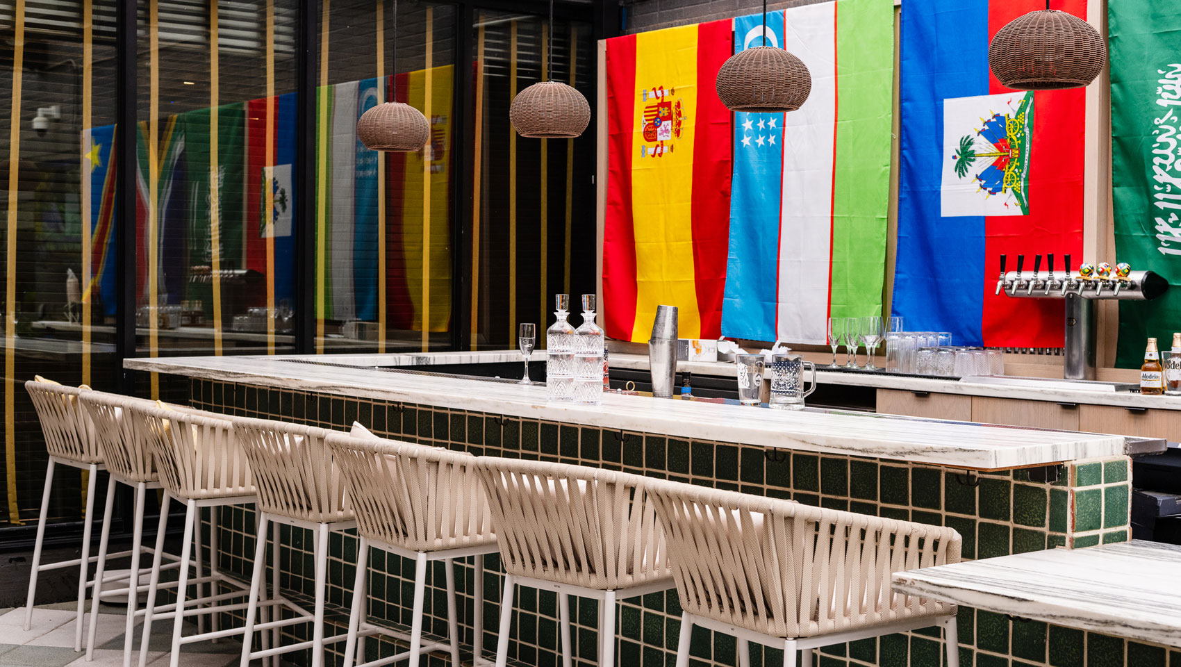 Soccer watch party set-up at Willow Bar at The Betty with different country flags